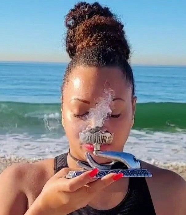 Sage burning on the beach. 
